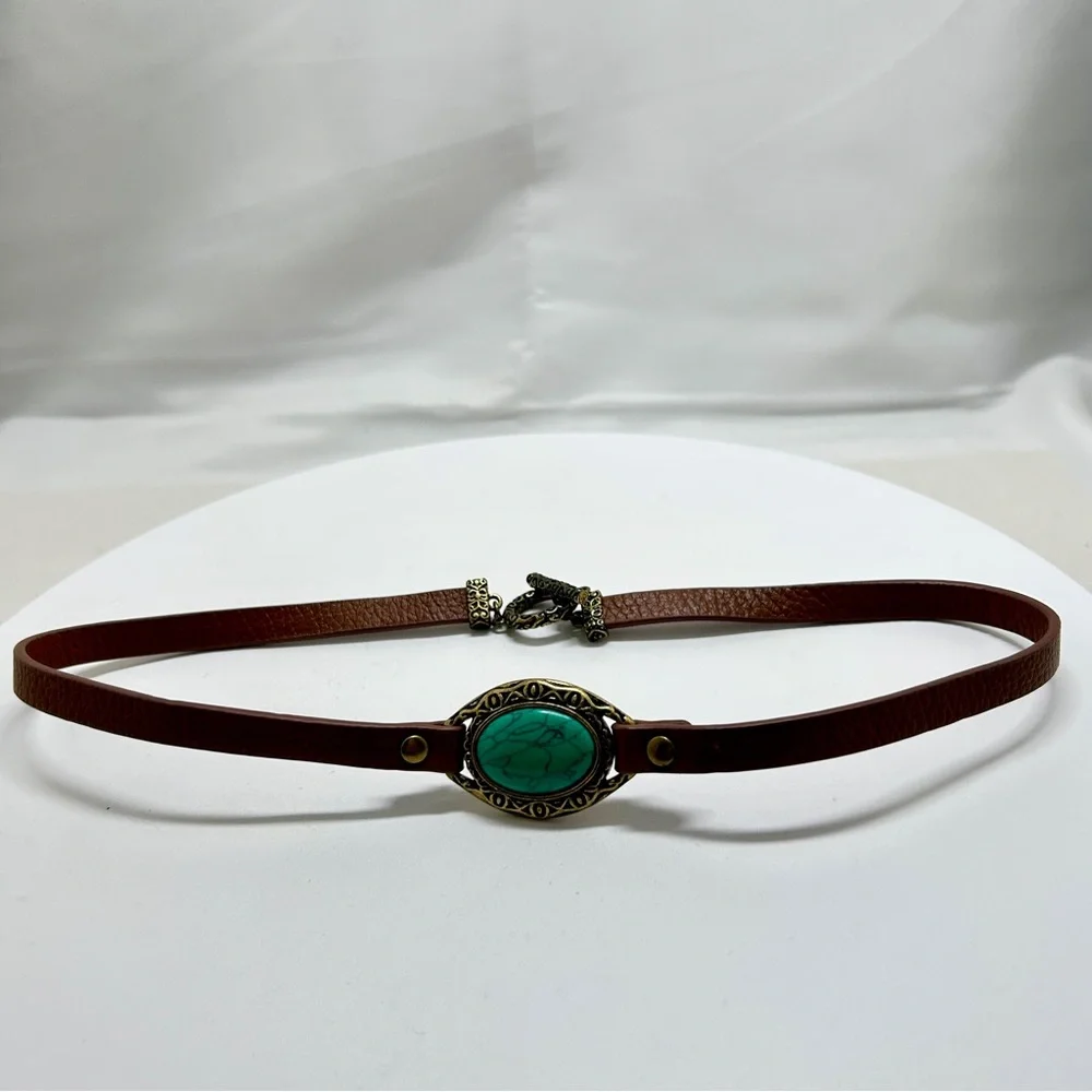 Brown Leather, Gold, Turquoise Necklace?, Belt?
